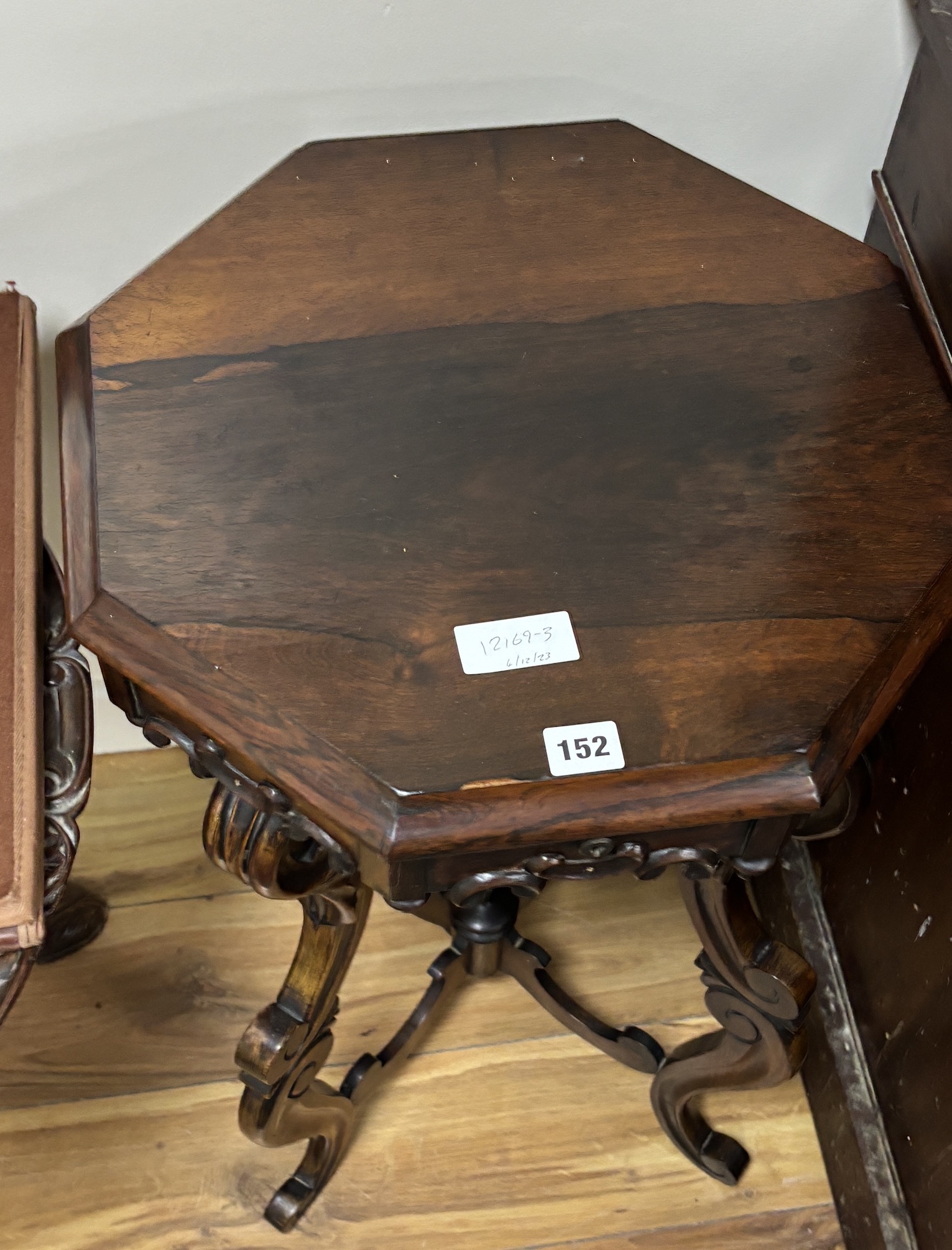 A Victorian octagonal rosewood work table, width 44cm, height 69cm